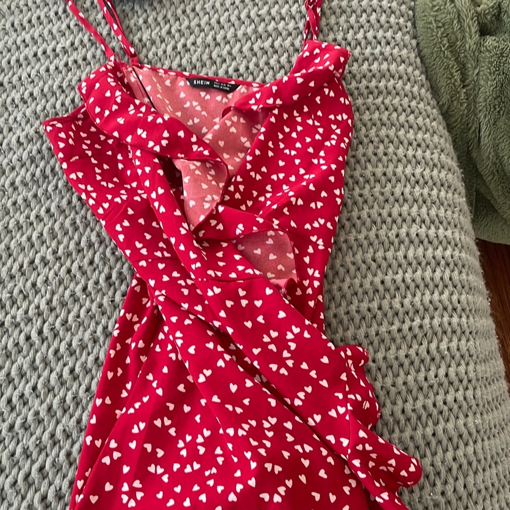 Mini wrap up red with white hearts dress.